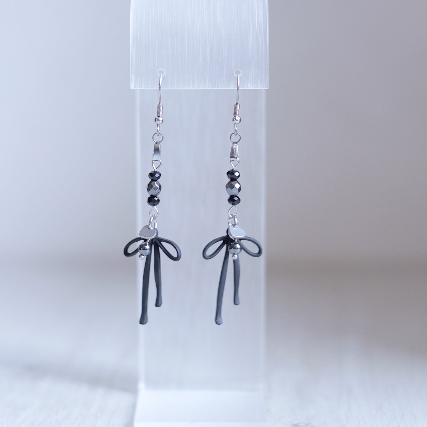 Coquettes Noires Earrings – Silver Stainless Steel
