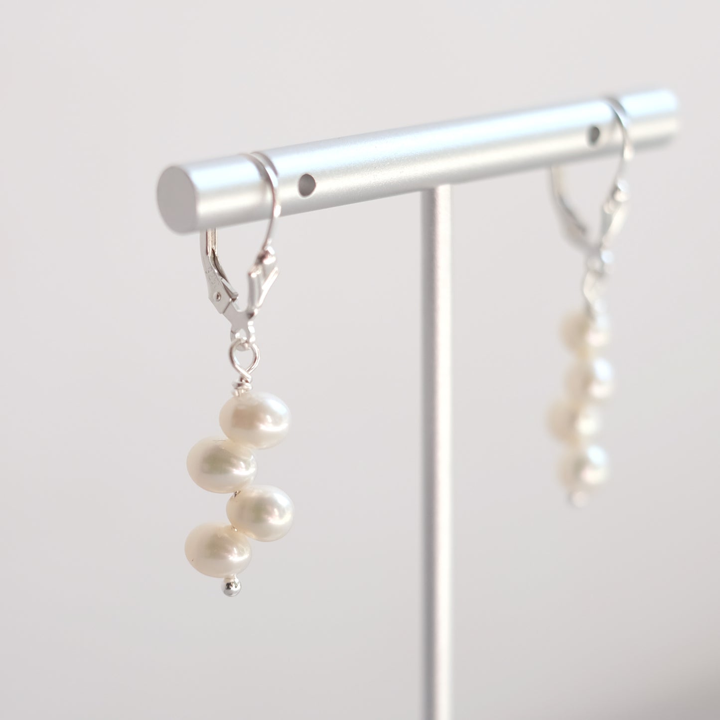 Sterling Silver Earrings with Four Cream Freshwater Pearls