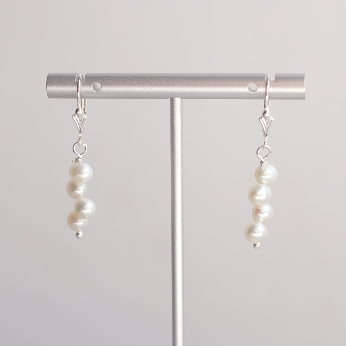 Sterling Silver Earrings with Four Cream Freshwater Pearls
